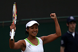 Anne Keothavong celebrates after defeating Laura Pous-Tio.