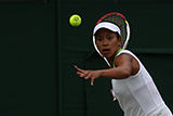 Anne Keothavong prepares to hit a forehand.