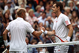 Andy Murray high fives Nicolay Davydenko after winning his first round match.