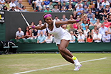 Serena Williams reaches to hit a forehand during her opening round match.